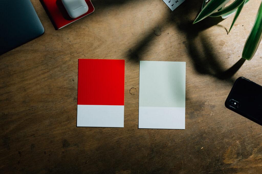 Image of Colors - One is in Red and other one is close to white